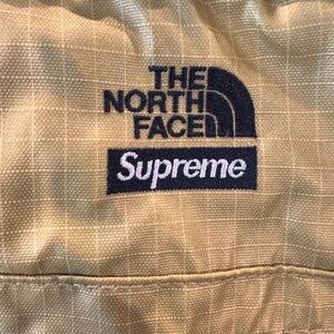 The North Face x Supreme shoulder bag gold metallic